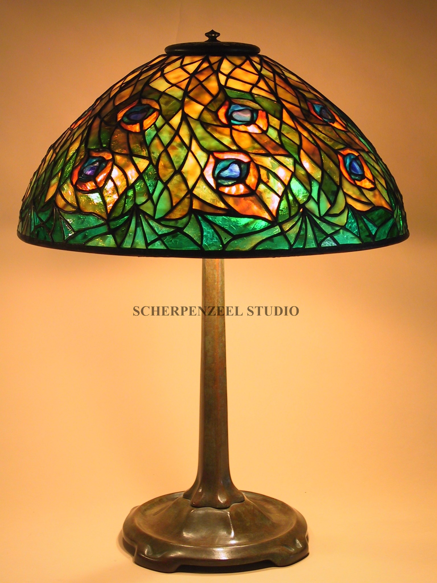 Peacock on small stick base