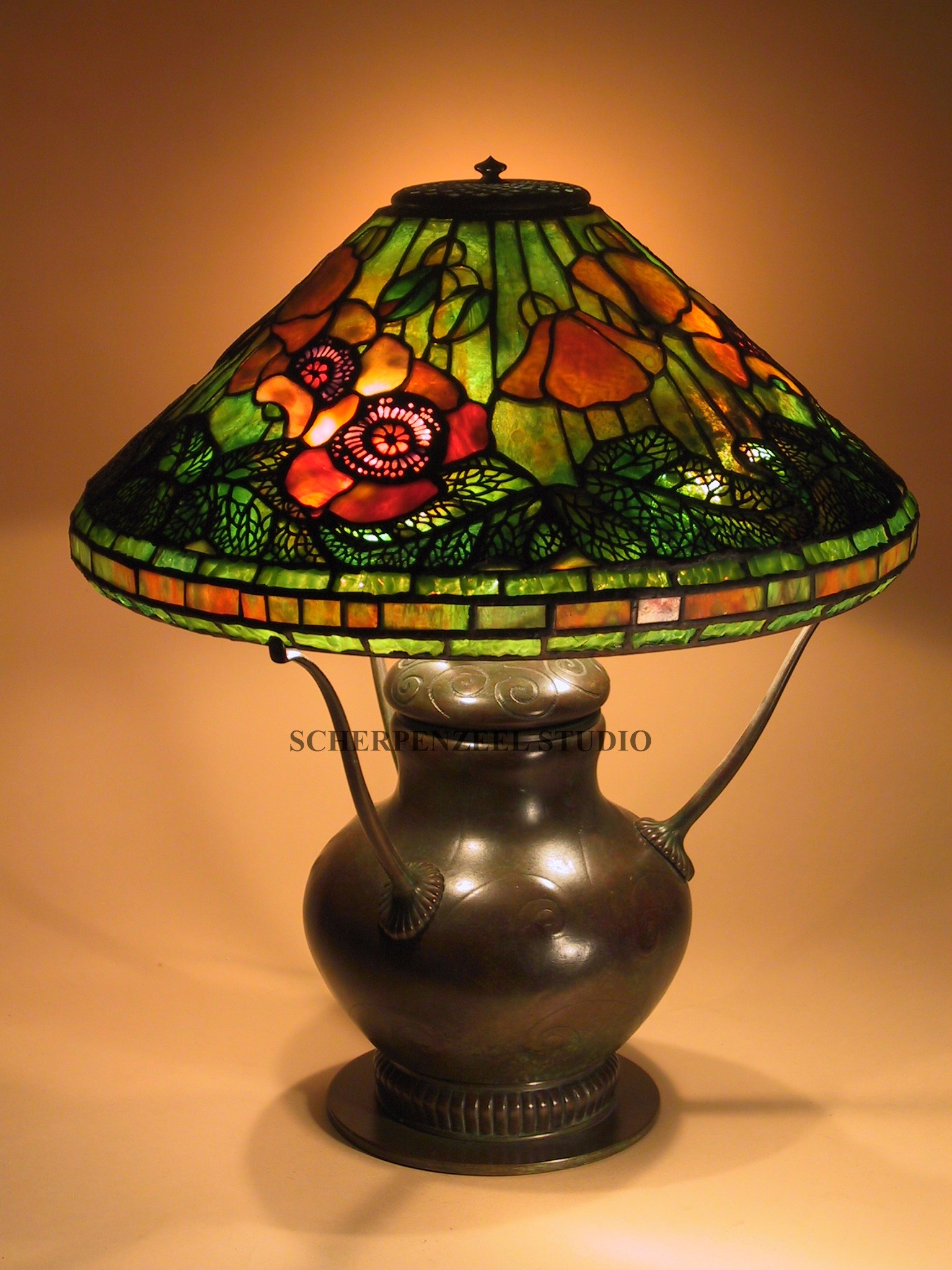 Poppy on decorated urn base