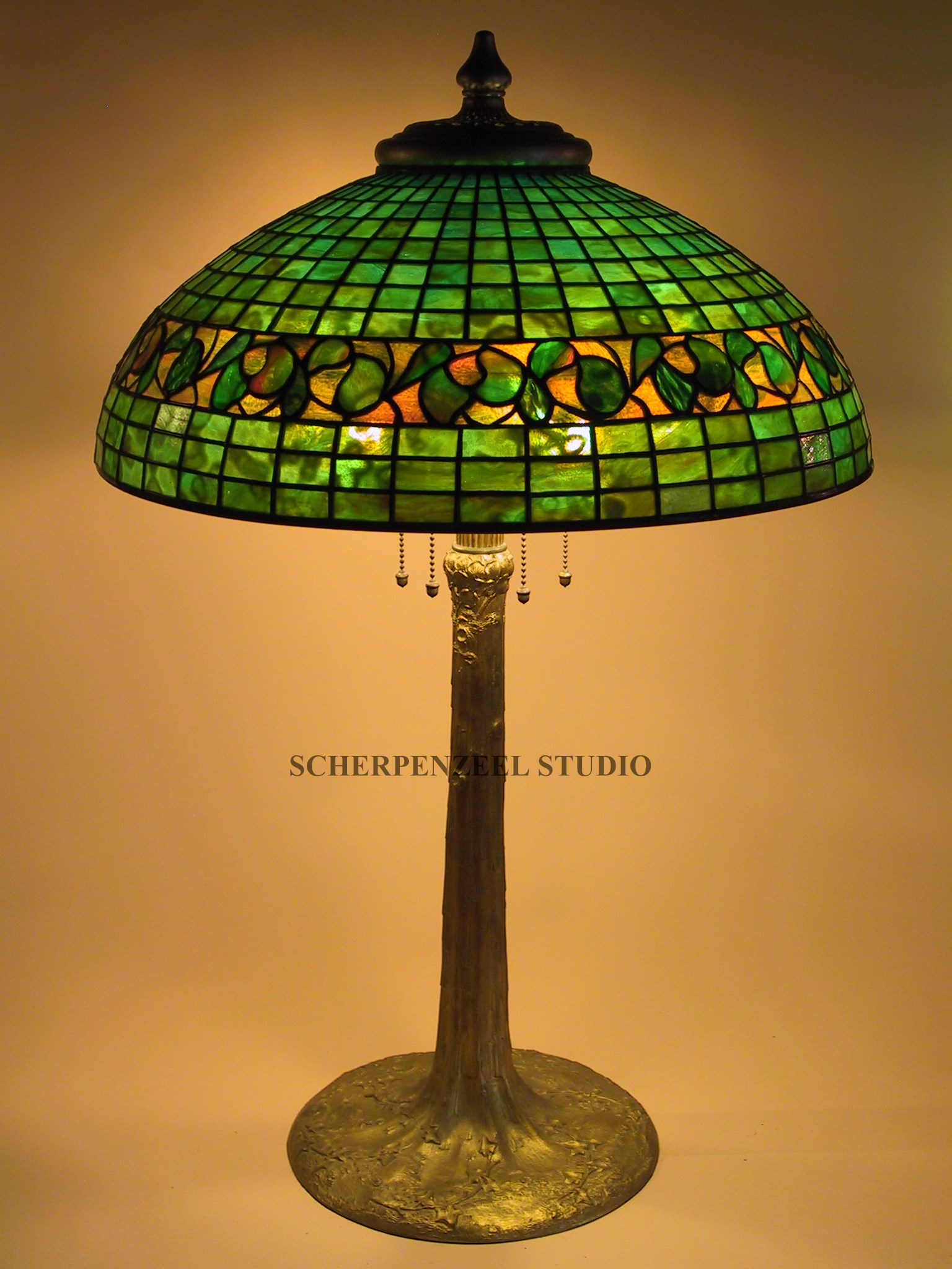Swirling leaf on antique lamp base