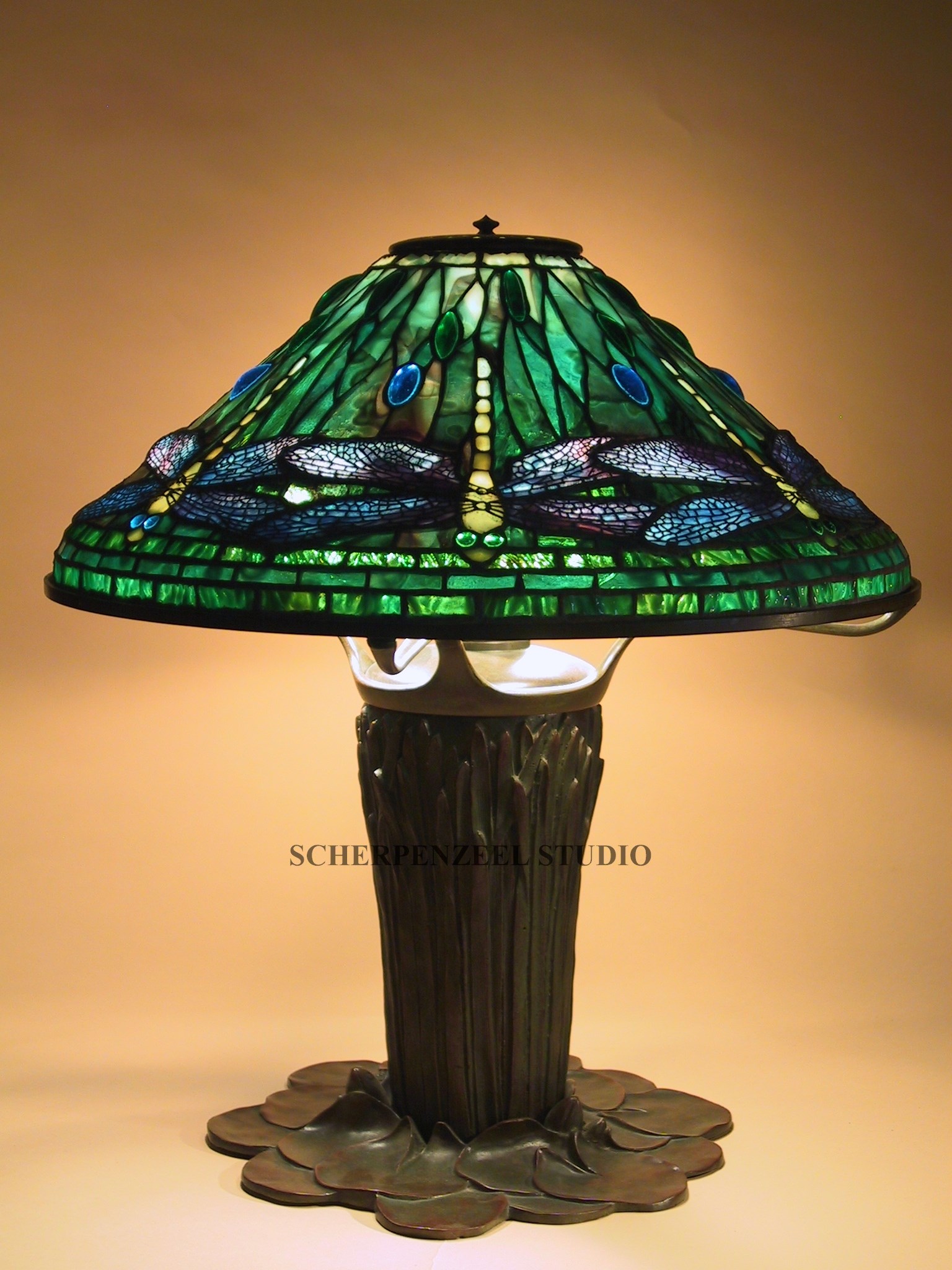 Dragonfly on Cattail base