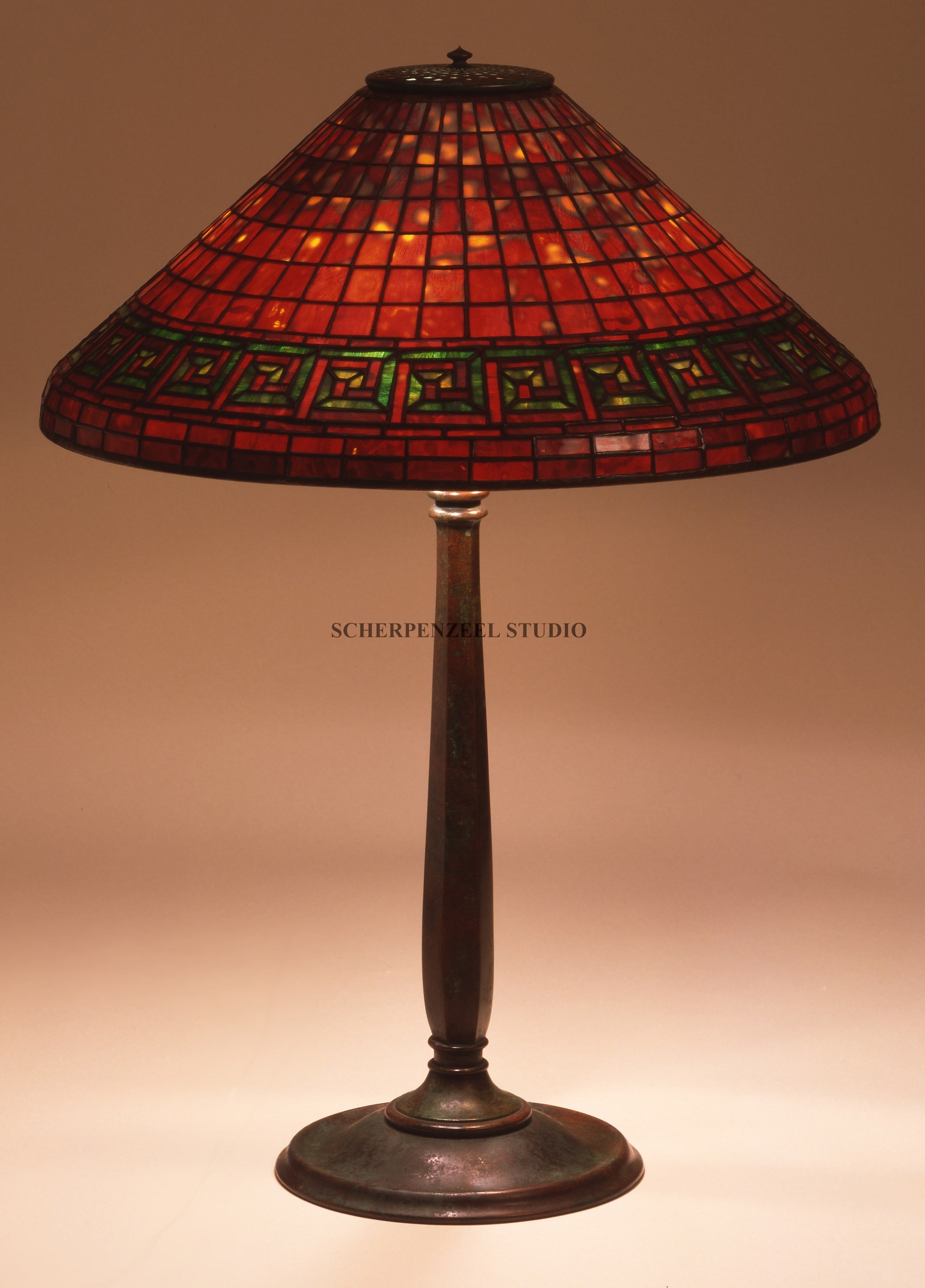 Greek key on round stick base