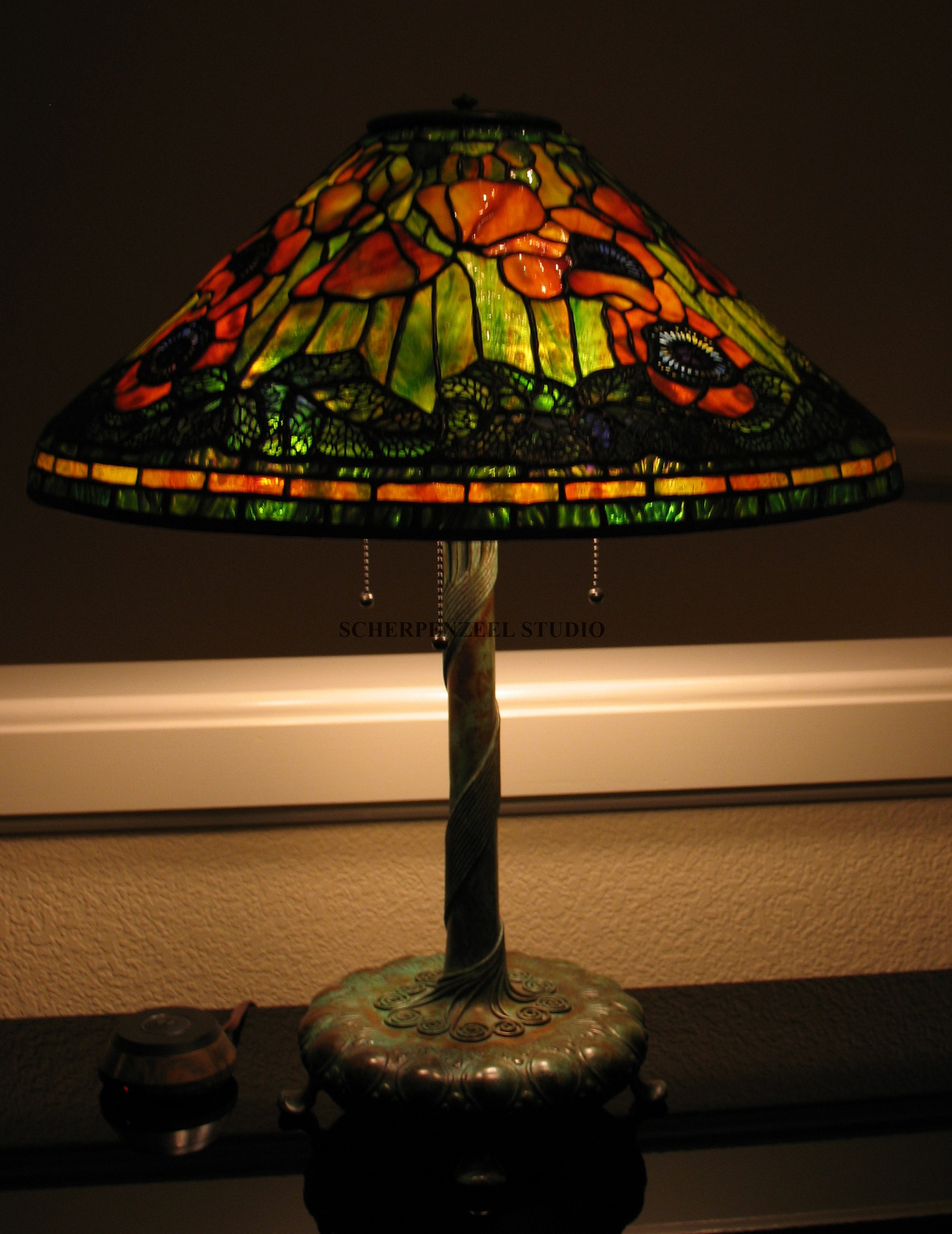 Poppy on decorated library base